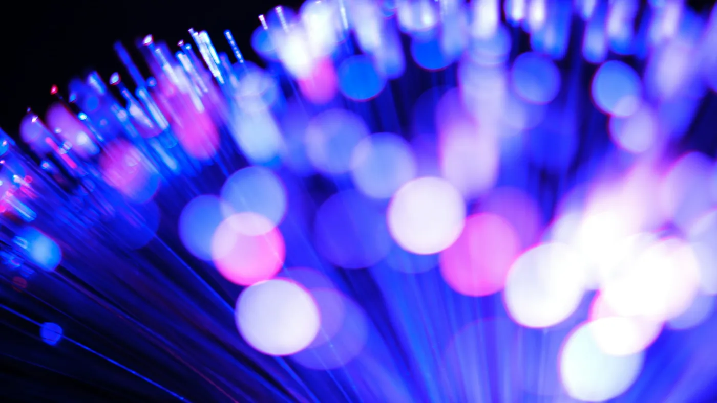 Fibre-optic strands glowing blue